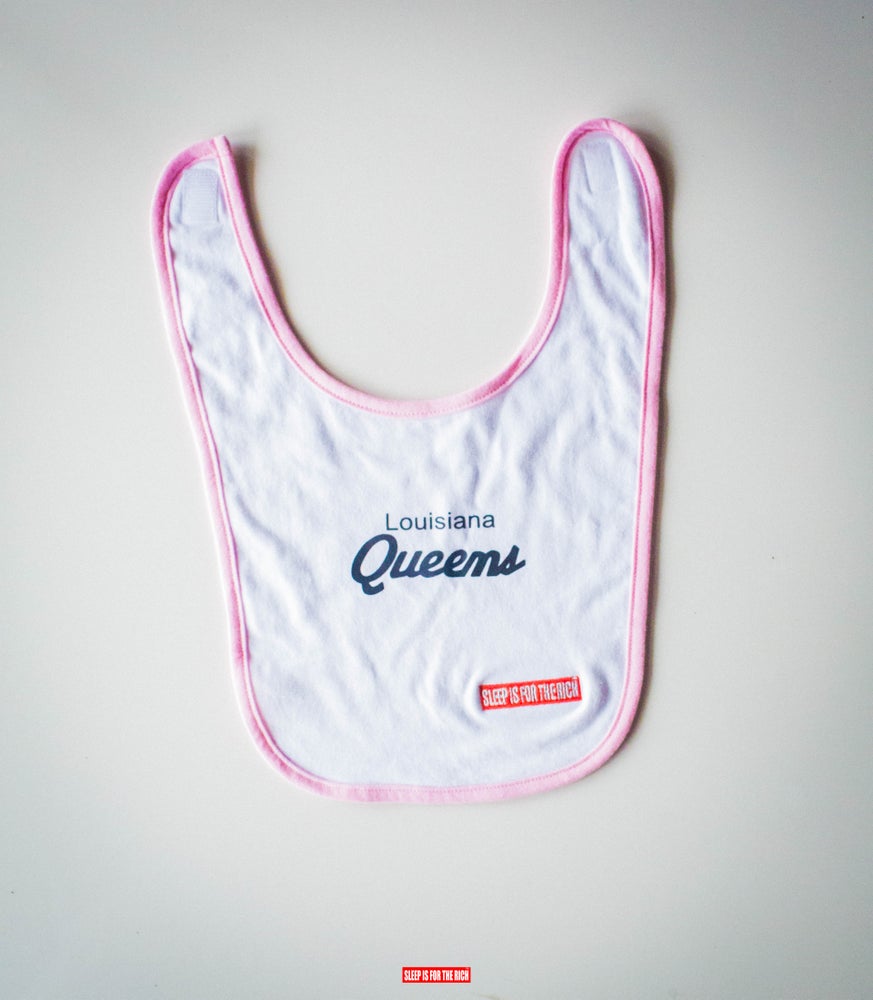 “Louisiana Queens” Baby Bib (White/Pink Trim)